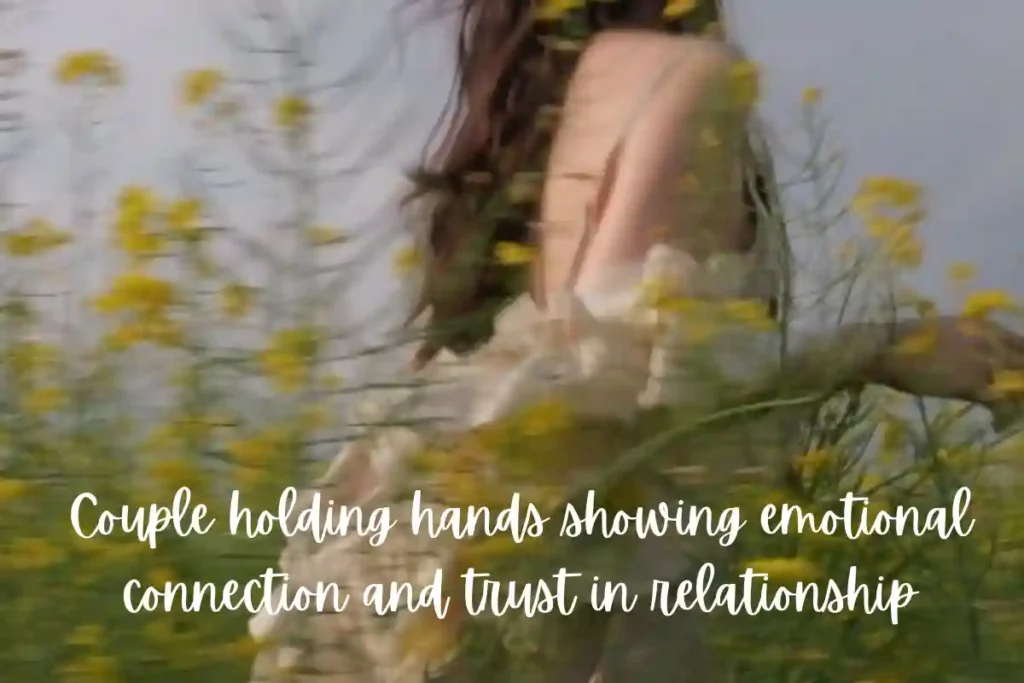 Couple holding hands showing emotional connection and trust in relationship