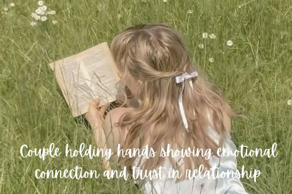 Couple holding hands showing emotional connection and trust in relationship